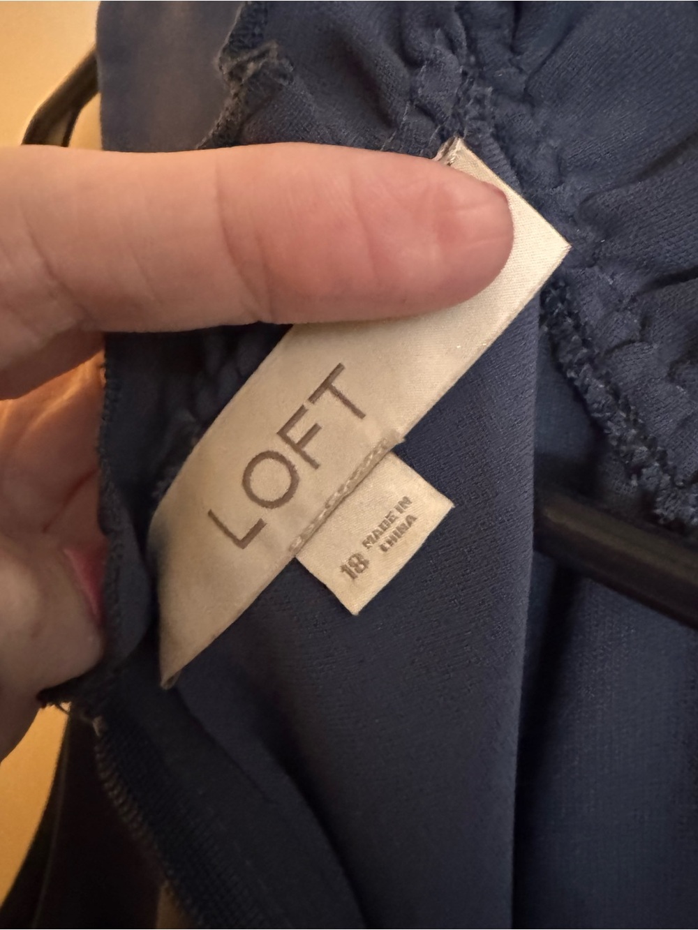 Label-only image of women's jacket